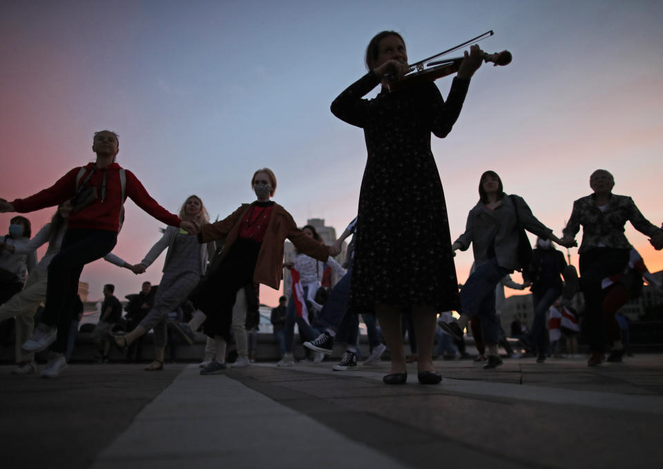 MINSK, BELARUS - SEPTEMBER 3, 2020: Belarusian opposition supporters perform while taking part in a protest in Independence Square. Since the announcement of the 2020 Belarusian presidential election results on August 9, mass protests against the election results have been erupting in major cities across Belarus. Sergei Bobylev/TASS (Photo by Sergei Bobylev\TASS via Getty Images)