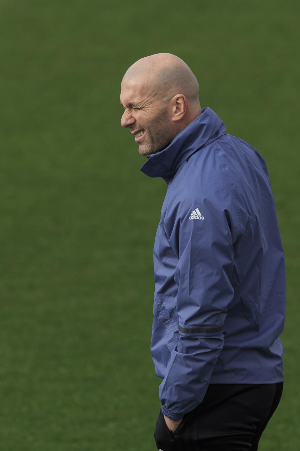 Real Madrid's head coach Zinedine Zidane blinks an eye during a training session at the Valdebebas stadium ahead of Wednesday's Champions League soccer match between Real Madrid and Napoli, in Madrid, Spain, Tuesday, Feb. 14, 2017 . (AP Photo/Daniel Ochoa de Olza)