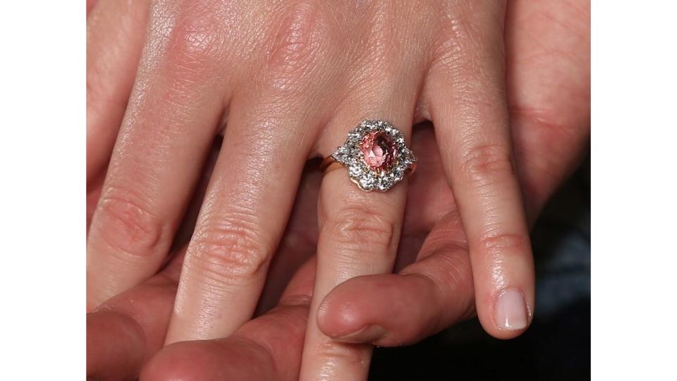 A close-up of Princess Eugenie's padparadscha sapphire engagement ring