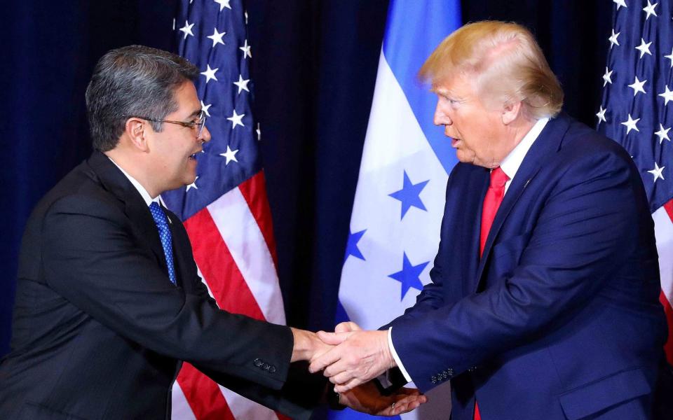 Juan Orlando Hernandez signs an agreement with Donald Trump for Honduras to accept more asylum seekers heading to the US