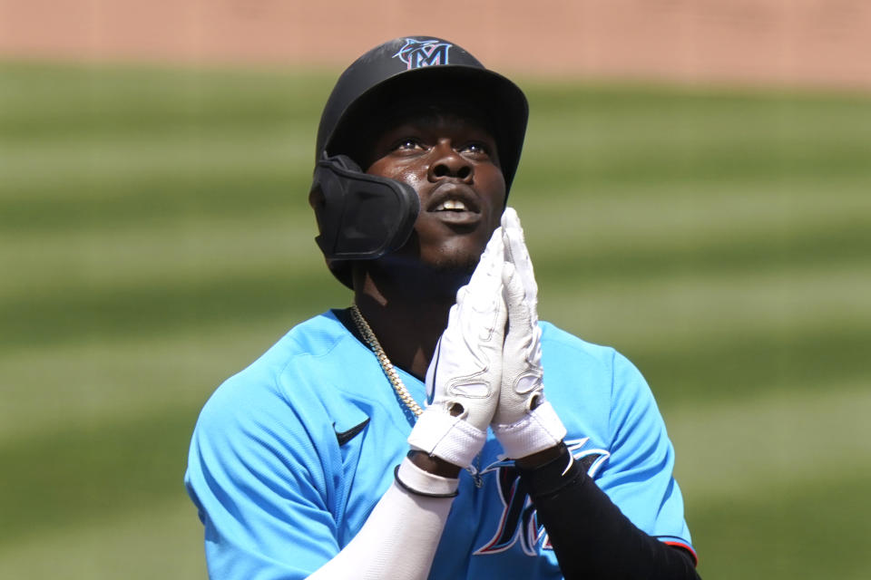 Miami Marlins' Jazz Chisholm reacts as he crosses home plate after hitting a solo home run during the fifth inning of a spring training baseball game against the New York Mets, Wednesday, March 17, 2021, in Jupiter, Fla. (AP Photo/Lynne Sladky)