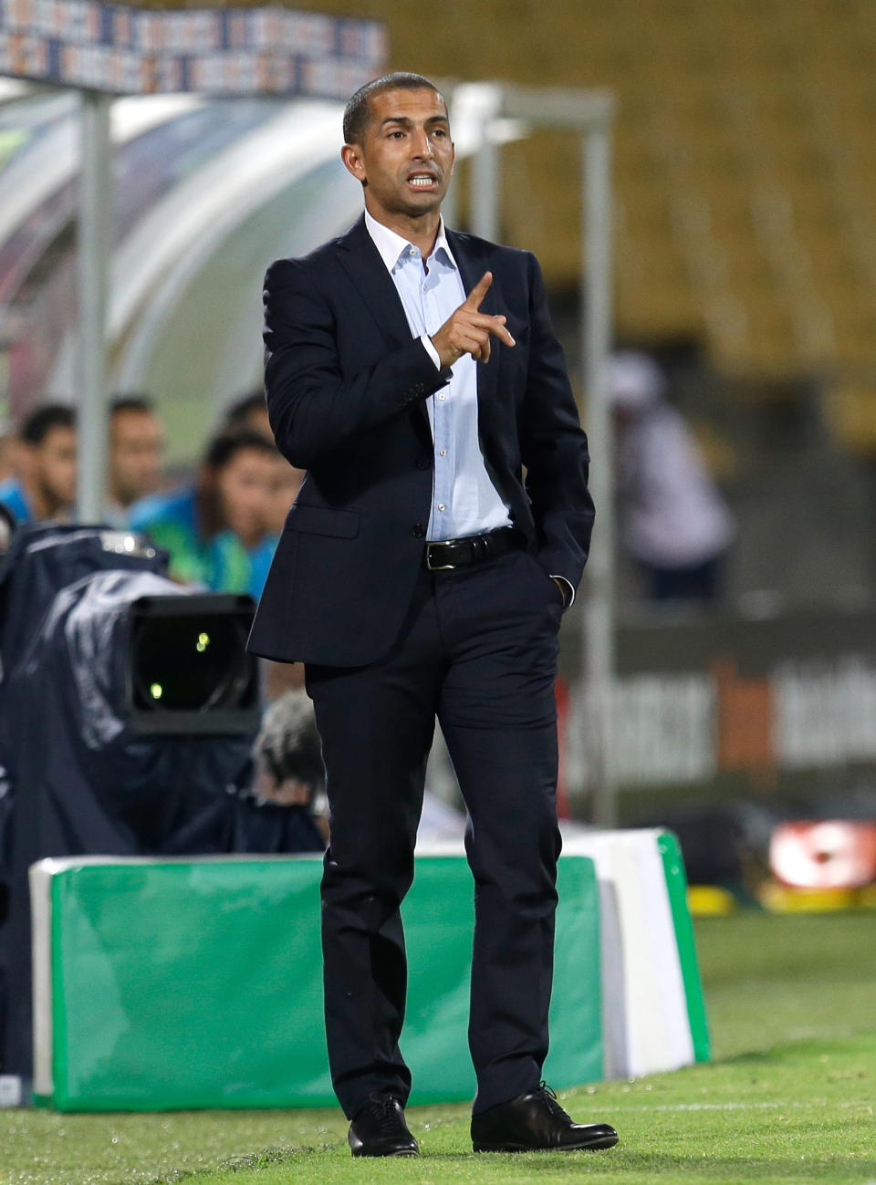 FILE - In this Jan. 30, 2013, file photo, Ivory Coast's head coach Sabri Lamouchi from France gestures during their African Cup of Nations group D match with Algeria at the Royal Bafokeng stadium in Rustenburg, South Africa. The Elephants had a comfortable qualification run under French coach Sabri Lamouchi, with a team filled with Europe-based talent including Manchester City's Yaya Toure. (AP Photo/Armando Franca, File)