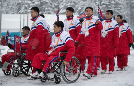 The delegation and the team of North Korea arrive at The Paralympic Village in Pyeongchang, South Korea, March 8, 2018. OIS/IOC/Thomas Lovelock/Handout via Reuters