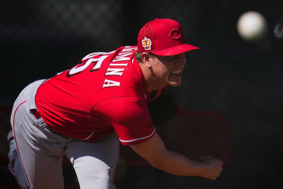 Cincinnati Reds relief pitcher Casey Legumina warms up in the bullpen. His fastball is one of the most interesting pitches at spring training.