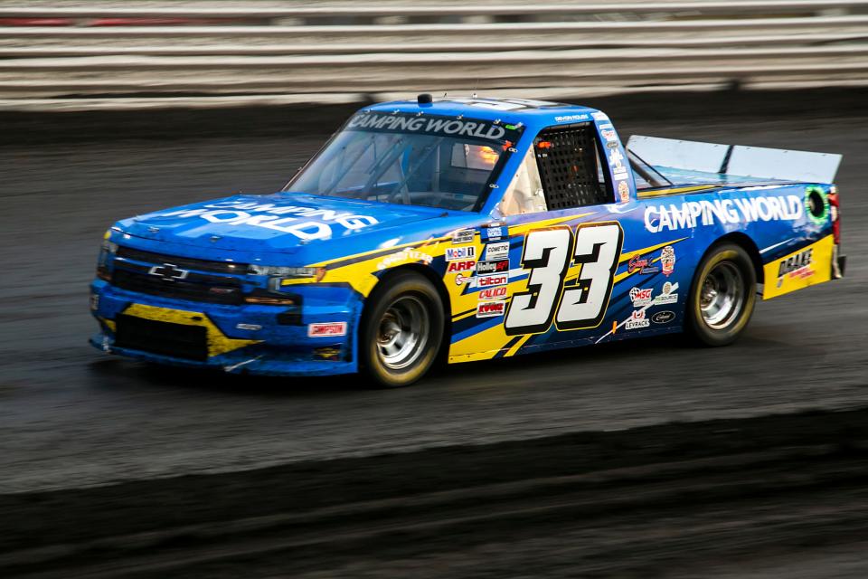 NASCAR Camping World Truck Series driver Devon Rouse (33) turns into a straightaway during the Corn Belt 150, Friday, July 9, 2021, at the Knoxville Raceway in Knoxville, Iowa.