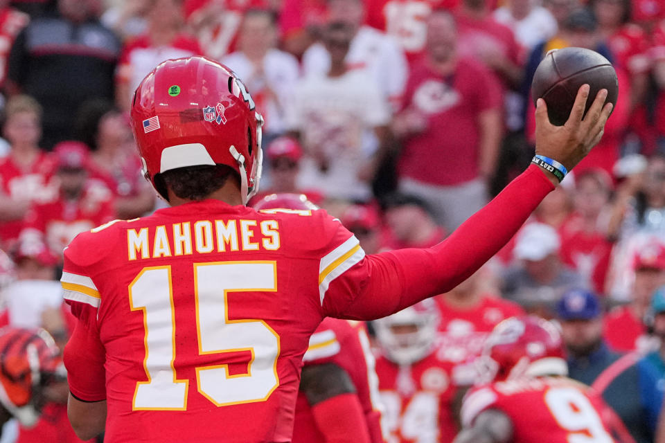 September 15, 2024; Kansas City, Missouri, USA; Kansas City Chiefs quarterback Patrick Mahomes (15) throws a pass against the Cincinnati Bengals during the game at GEHA Field at Arrowhead Stadium. Mandatory attribution: Denny Medley-Imagn Images