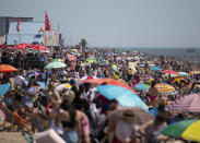 Large crowds gather at Southend beach as temperatures soar to as high as 34 degrees across the UK.