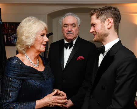 Britain's Camilla, Duchess of Cornwall talks to Kyle Soller, winner of the best actor award, after attending the Olivier Awards at the Royal Albert Hall in London, Britain April 7, 2019. John Stillwell/Pool via REUTERS