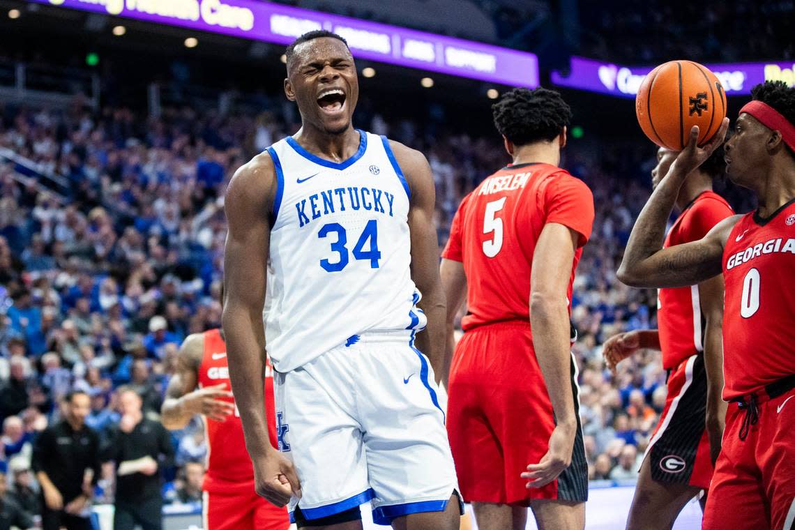 Kentucky forward Oscar Tshiebwe (34) celebrates scoring and drawing a foul against Georgia Bulldogs during Tuesday’s game at Rupp Arena.