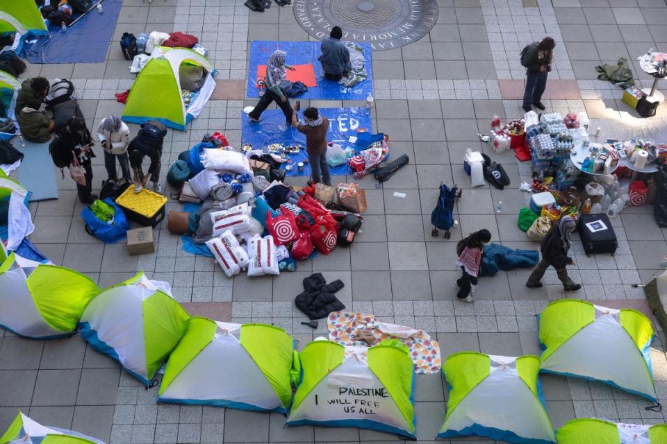 New York University students set up a “Liberated Zone” tent encampment in Gould Plaza at NYU Stern School of Business on April 22, 2024.<span class="copyright">Michael M. Santiago—Getty Images</span>