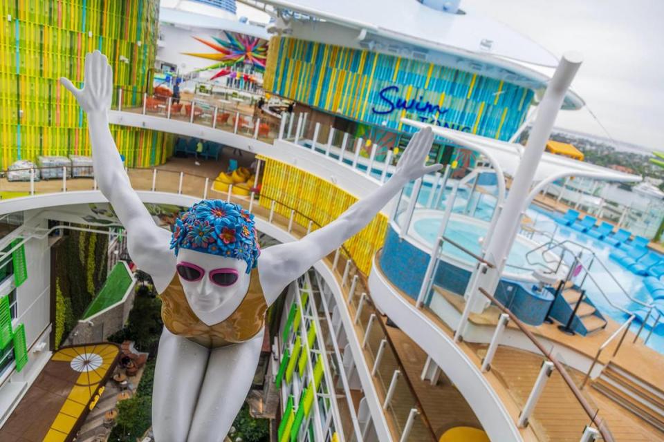 Swimmer sculpture feature in the Chill Island deck area of Icon of the Seas.