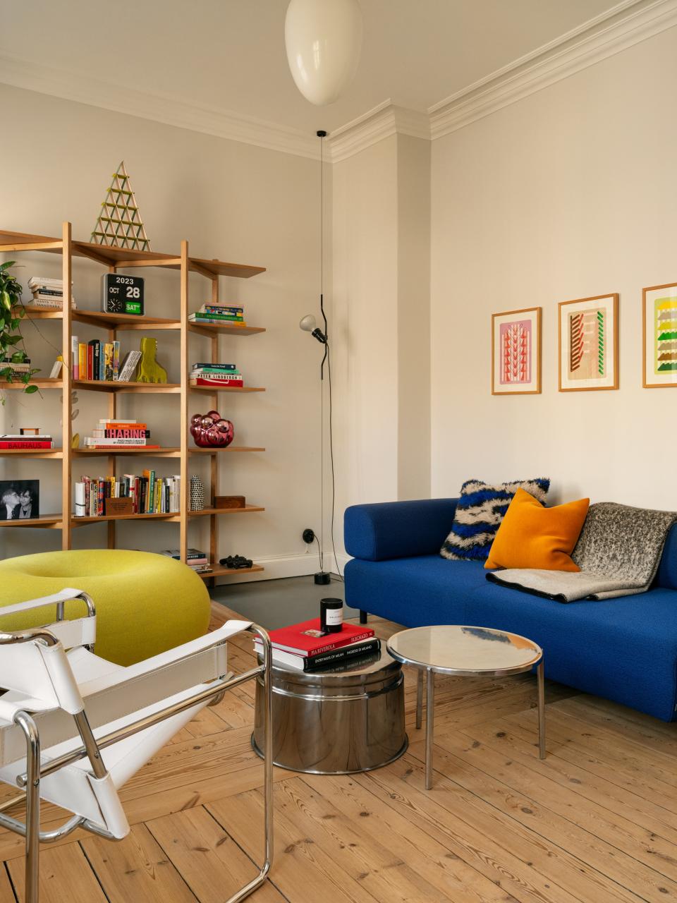 Hem furniture—like this cobalt Palo sofa—can be spotted throughout Cristina’s one-bedroom apartment.