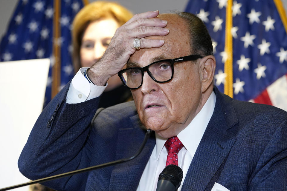 FILE - In this Nov. 19, 2020, file photo, former New York Mayor Rudy Giuliani, who was a lawyer for President Donald Trump, speaks during a news conference at the Republican National Committee headquarters in Washington. U.S. prosecutors in 2019 sought the electronic messages of two ex-Ukrainian government officials and a Ukrainian businessman as part of their probe of Rudolph Giuliani's dealings in that country, a lawyer accidentally revealed in a court filing Tuesday, May 25, 2021. The filing said federal prosecutors in New York had obtained an email account believed to belong to the former prosecutor general of Ukraine, Yuriy Lutsenko. (AP Photo/Jacquelyn Martin, File)