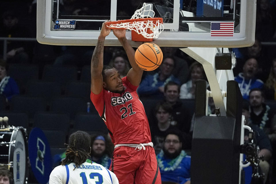 Southeast Missouri State's Josh Earley (21) dunks during the first half of a First Four college basketball game against Texas A&M Corpus Christi in the NCAA men's basketball tournament, Tuesday, March 14, 2023, in Dayton, Ohio. (AP Photo/Darron Cummings)