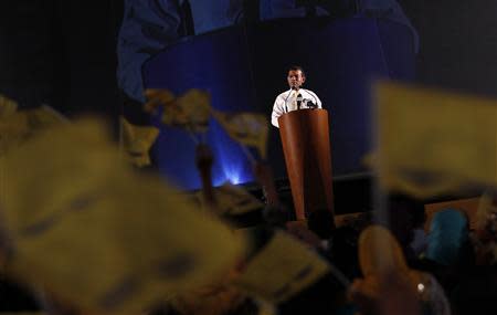 Maldives presidential candidate Mohamed Nasheed, who was ousted as president in 2012, addresses his supporters during a political rally ahead of the presidential election in Male, September 5, 2013. REUTERS/Dinuka Liyanawatte