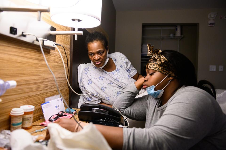 Theresa Mozzee and her daughter, Miracle, speak with a representative at the Housing Authority of the City of Charleston about the status of their hotel assistance as they wait for repairs to their public housing unit to finish. Theresa, 59, who has cancer and lupus, said their living situation has taken a mental toll. The unit they lived in for the past five years had extensive issues with mold, vermin and pests that might have made her sicker. After months of issues with the housing authority, now they can't get a housing voucher. “I have bad days,” she said. “Sometimes, I just want to die.”