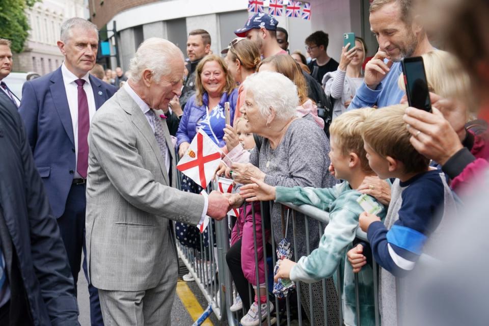 Charles speaks to members of the public as he arrives at the Royal Square in St Helier, Jersey (Arthur Edwards/The Sun/PA) (PA Wire)