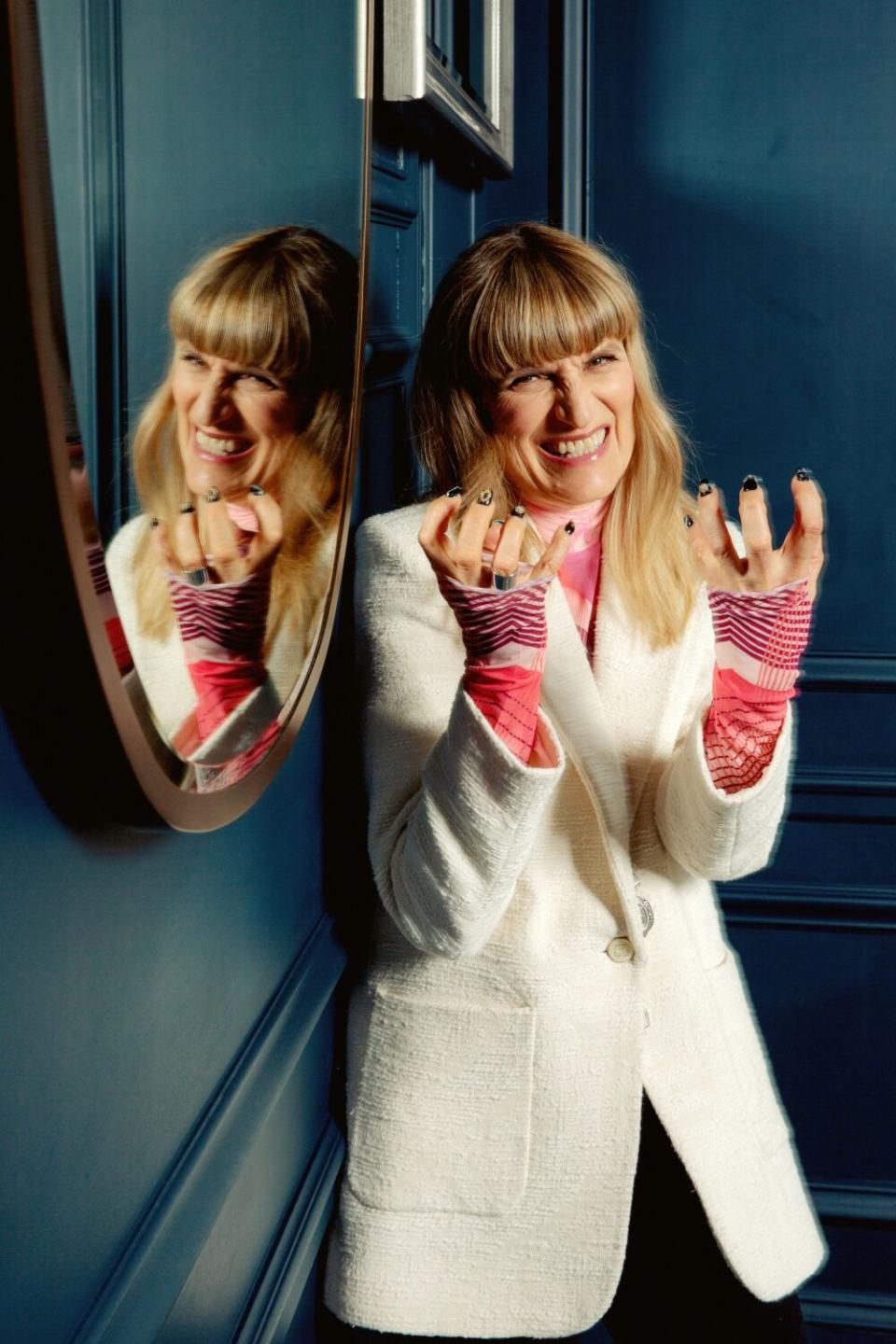 Director Catherine Hardwicke flashes her new finger nails.