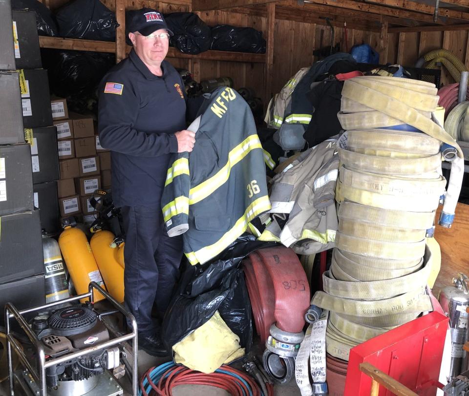 Ogunquit Fire Chief Russell Osgood is seen here on Tuesday, June 20, 2023, amidst all the firefighting gear and equipment that has been donated and will be sent to help firefighters in war-torn Ukraine.