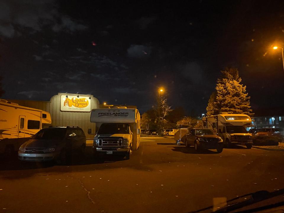 A Cracker Barrel parking lot full of RVs.