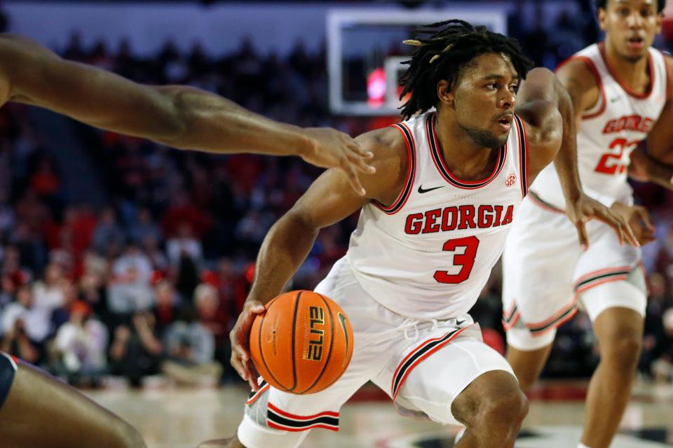 Georgia Bulldogs guard Kario Oquendo (3) drives against the Auburn Tigers at Stegeman Coliseum in Athens on Feb. 5, 2022. The Bulldogs have verbally committed to play in Savannah in 2023 at Enmarket Arena, according to Rob Wells of the Savannah Sports Council.