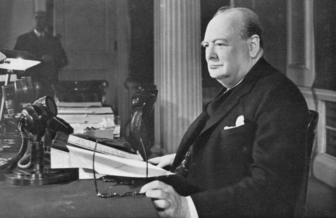 Mr. Churchill's V.E. Day Broadcast', 1945 (1955). Mr. Churchill broadcast end of hostilities of WWII, one minute after midnight, although 'ceasefire' had been sounded along the front. Millions of people rejoiced in the news that Germany had surrendered, relieved the intense strain of total war was finally over. From Churchill: The Man of the Century - A Pictorial Biography, edited by Neil Ferrier. [L.T.A. Robinson Limited, London, 1955]. Artist Unknown(Photo by The Print Collector/Getty Images)