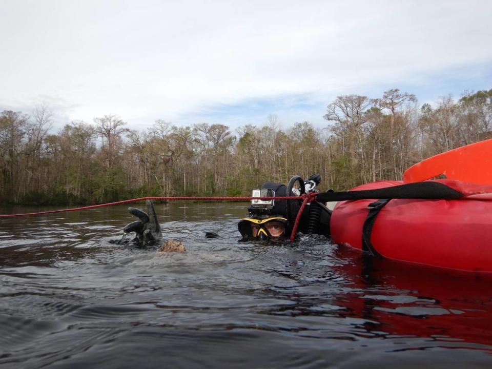 Jessica Cook Hale prepares to dive during a 2019 mastodon excavation in Wakulla Springs, Florida.