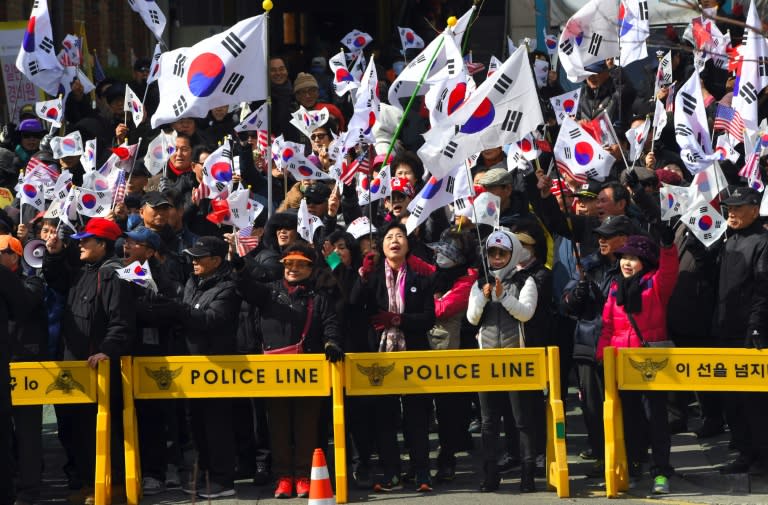 Protesters waving South Korean and US flags come out in support of impeached President Park Geun-Hye