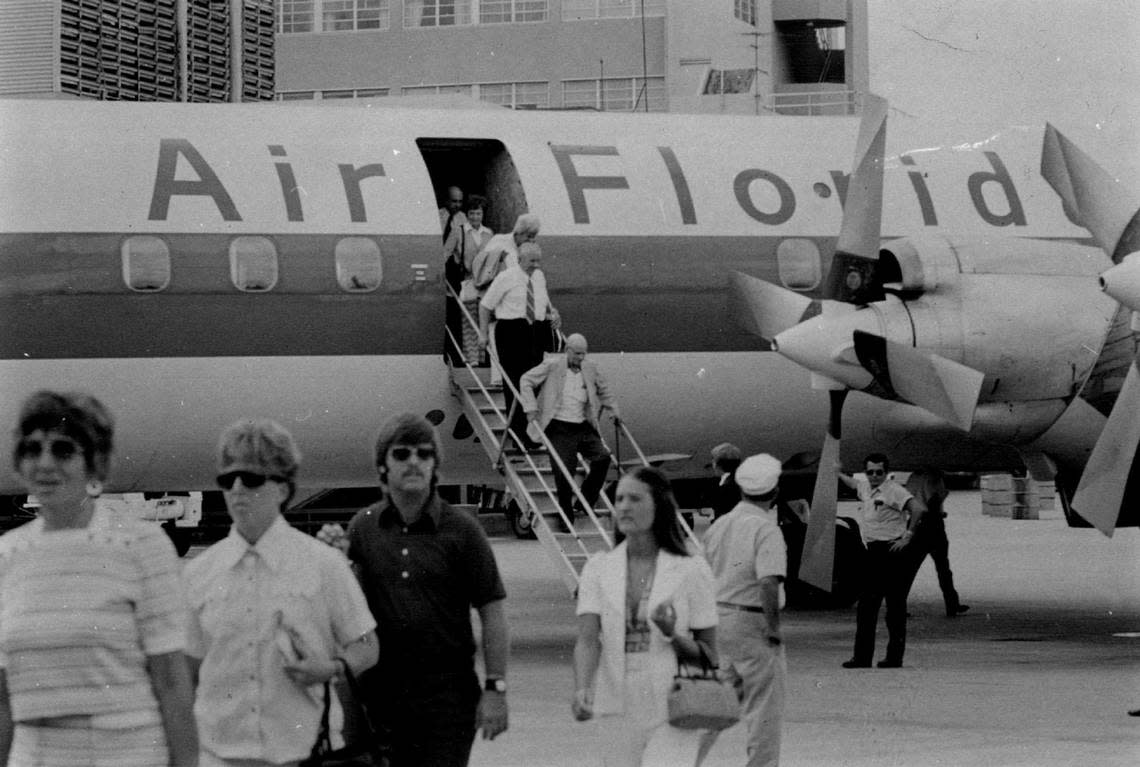 Air Florida passengers exit a plane in 1974.