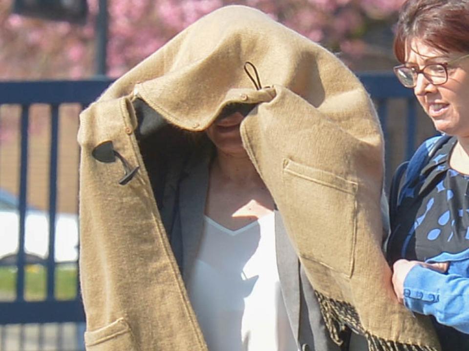 Sarah Higgins, 42, pictured leaving Huddersfield Magistrates' Court in April 2019, has been charged with manslaughter over the death of 10-month-old Skylar Giller in August 2017: Alex Cousins/SWNS/file photo