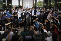 Former finance minister Lim Guan Eng speaks to media outside court house in Kuala Lumpur, Friday, Aug. 7, 2020. Lim has been charged with corruption over a $1.5 billion undersea tunnel project. Lim was part of a reformist government ousted in March, and his party slammed the criminal charge as political persecution by the new government. (AP Photo/Vincent Thian)