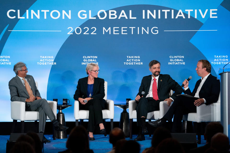 Manish Bapna, Energy Secretary Jennifer Granholm, Alvaro Lario and Tom Rivett-Carnac participate in a panel at the Clinton Global Initiative, Tuesday, Sept. 20, 2022, in New York. (AP Photo/Julia Nikhinson)