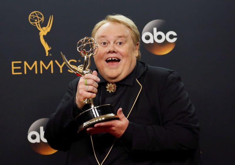 FILE PHOTO: Actor Louie Anderson poses backstage with his award for Best Supporting Actor in a Comedy Series for his role on the FX series "Baskets" at the 68th Primetime Emmy Awards in Los Angeles, California