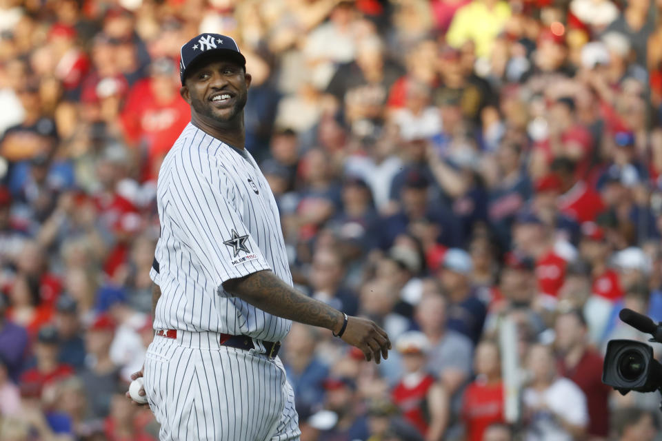 New York Yankees' CC Sabathia smiles as he prepares to throw out a ceremonial first pitch before the MLB baseball All-Star Game, Tuesday, July 9, 2019, in Cleveland. (AP Photo/John Minchillo)