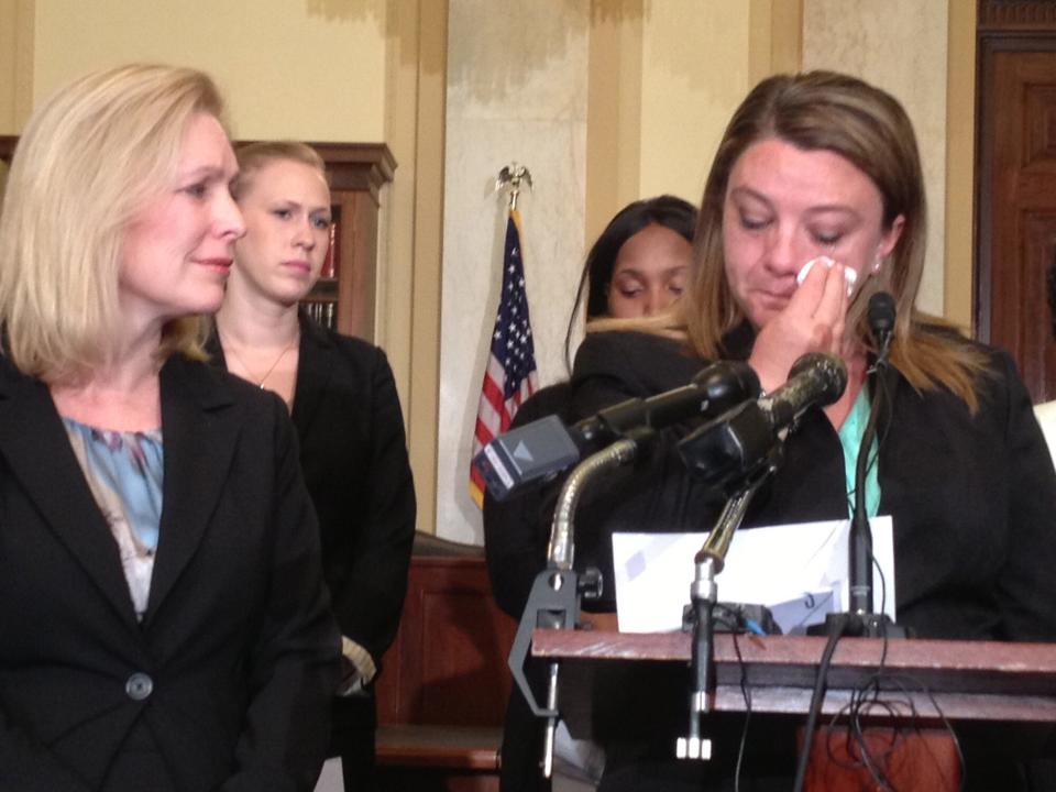 Military sexual assault survivor Jennifer Norris expresses her support for legislation introduced by Sen. Kirsten Gillibrand, D-N.Y., left, on May 16, 2013. A bipartisan group of House and Senate lawmakers led by Gillibrand proposed legislation that would authorize military JAG prosecutors to make the decision whether to prosecute cases potentially involving a jail sentence of a year of more.