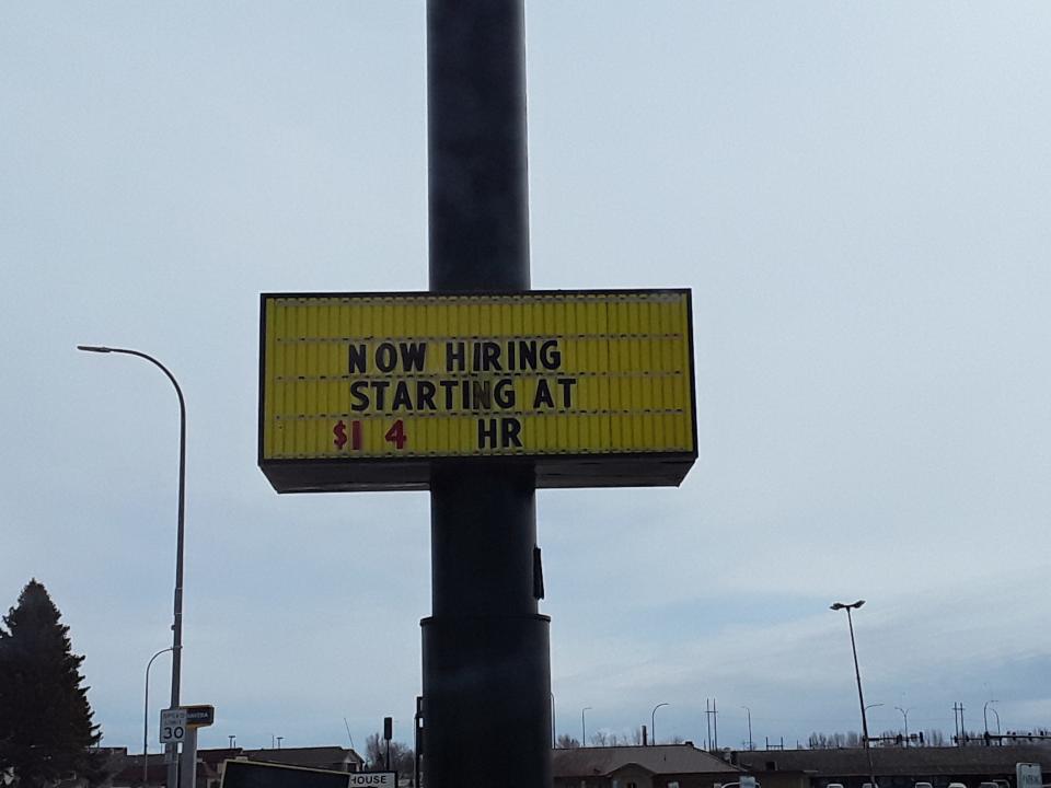 Local McDonald's advertises for prospective employees on their highway signage.