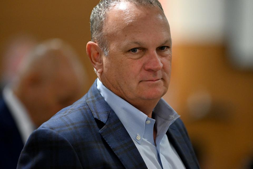 New College President Richard Corcoran leaves the courtroom after sitting for awhile in the gallery during Ashley Benefield’s trial for the second-degree murder of her husband, Doug Benefield, in 2020 at the Manatee County Judicial Center, July 25, 2024.