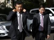 China's ambassador to Britain Liu Xiaoming arrives at 10 Carlton House Terrace in central London, where representatives from Britain, China, France and energy company EDF will sign an agreement to build and operate a new nuclear power station at Hinkley Point, Britain, September 29, 2016. REUTERS/Peter Nicholls