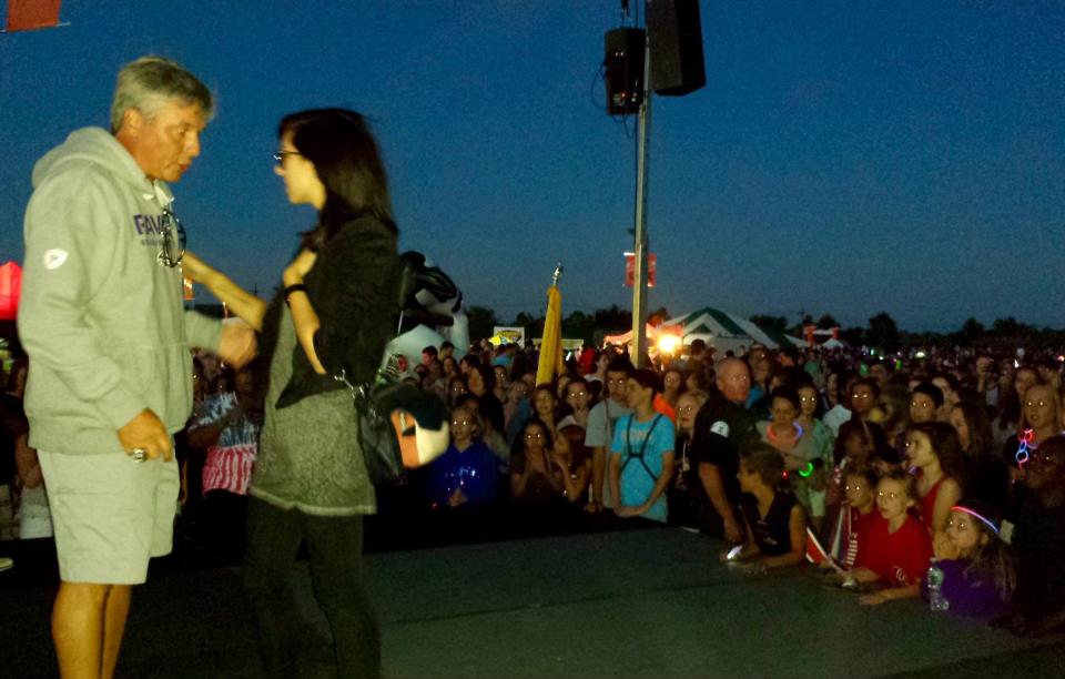 Ryan Brown's father Randy, then-mayor of Evesham Township, speaking with Christina Grimmie at a 2014 Independence Day event.