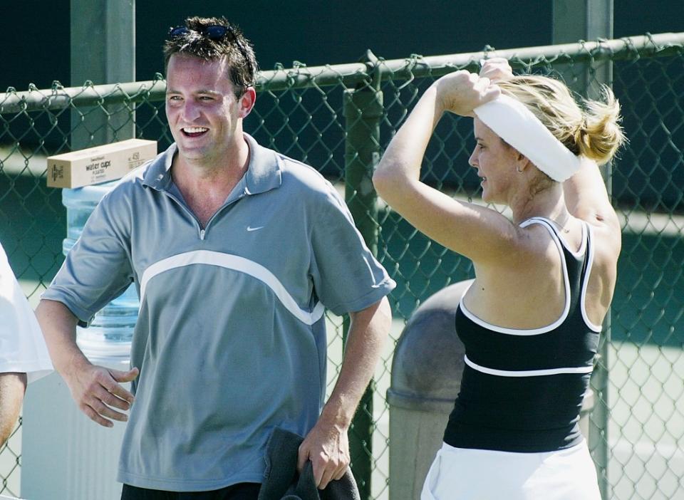 Perry and Quinlan met at a tennis game in the early 2000s. Getty Images