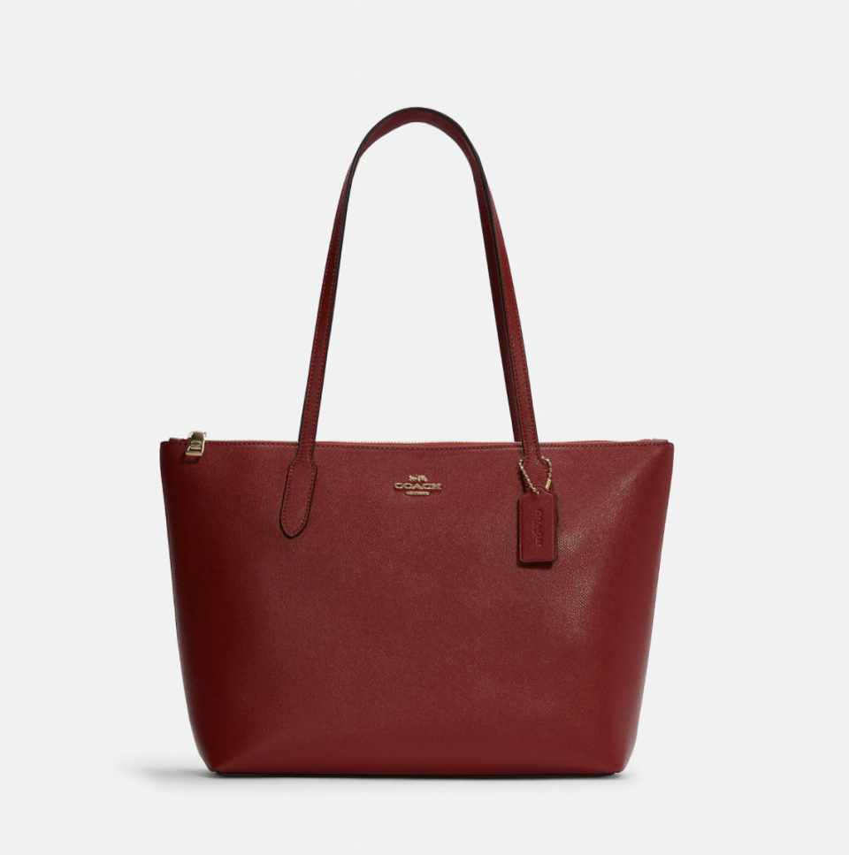 Zip Top Tote in red leather (Photo via Coach Outlet)