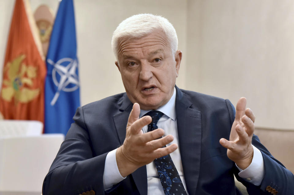 FILE - In this file photo dated Friday, Oct. 18, 2019, Montenegro's Prime Minister Dusko Markovic speaks during an interview with The Associated Press in Montenegro's capital Podgorica. Markovic said Monday May 25, 2020, the national borders will be opened as of June 1 for nationals of some European countries that meet the entry criteria of the small country’s health authorities, excluding former ally Serbia, drawing angry reaction from Serbian officials Tuesday.(AP Photo/Risto Bozovic, FILE)