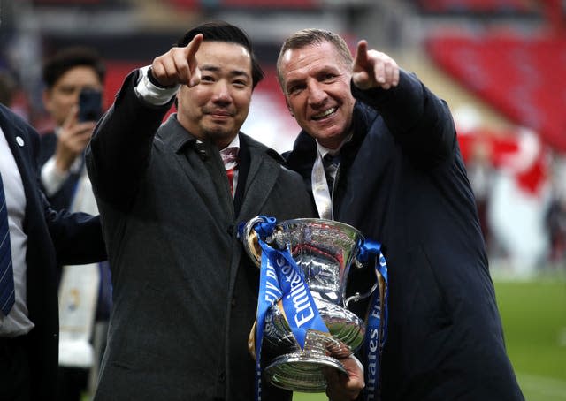 Leicester chairman Khun Aiyawatt Srivaddhanaprabha  and Brendan Rodgers