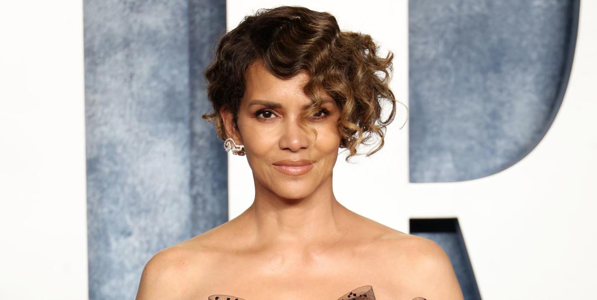 Halle Berry, 57, Sizzles in Plunging Dress With Thigh-High Slits During NYC  Outing - Parade