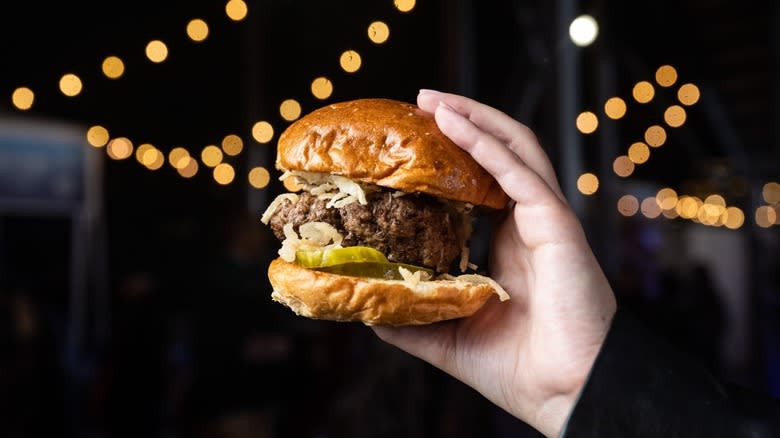 Burger in hand at festival