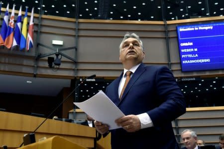 FILE PHOTO: Hungary's Prime Minister Viktor Orban speaks during a plenary session at the European Parliament (EP) in Brussels, Belgium April 26, 2017. REUTERS/Eric Vidal/File Photo