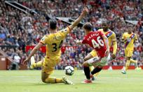 <p>Manchester United’s Josh Harrop, centre, scores his side’s first goal of the game, during the English Premier League soccer match between Manchester United and Crystal Palace, at Old Trafford </p>