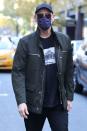 <p><i>The Mask </i>star Jim Carrey wears a face covering as he’s seen heading to lunch in N.Y.C. on Sunday.</p>