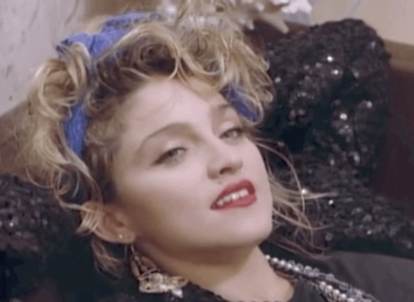Madonna in her "Into the Groove" music video