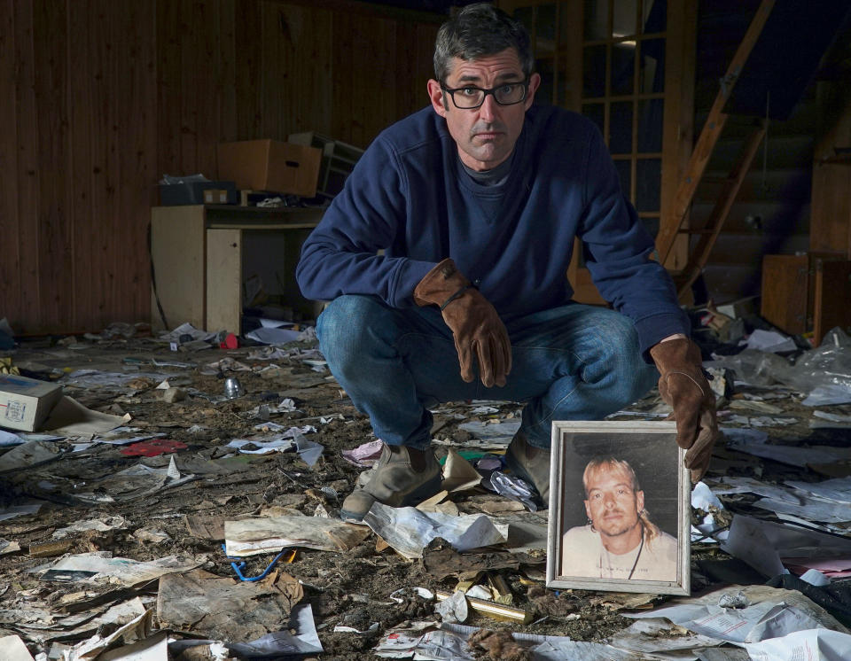 Louis holding a picture of a young Joe Exotic, at what remains of his home in Oklahoma (Jack Rampling / Mindhouse)